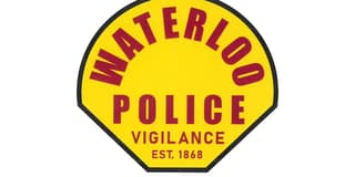 Waterloo teen found dead in brush after gunfire; police search home