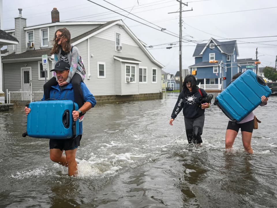Early-season nor'easter kills one and causes widespread damage across US Northeast