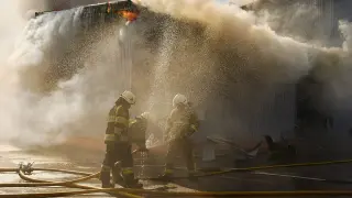 Dozens dead after Russian strike sparks Bucha-area warehouse blaze