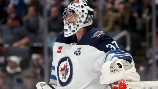 Winnipeg Jets suspend Connor Hellebuyck after he skips training camp