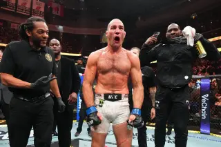 Strickland's battered shoulder powers historic UFC 328 upset