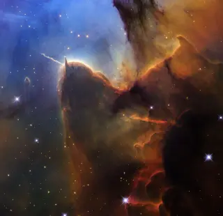 Hubble’s 36th anniversary spotlights newborn stars in the Trifid Nebula