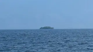 Mystery Green Floating Island Drifts Across Williston Lake, BC