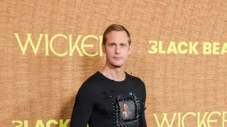 Skarsgård’s Colman-Printed Shirt and Wicker Suit Define 'Wicker' Launch
