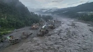 Rescuers descend into Nepal hydro tunnels to reach trapped workers amid flood crisis