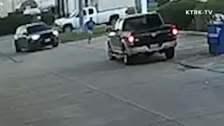 Surveillance footage shows ICE SUV striking man in Houston parking lot during fugitive chase