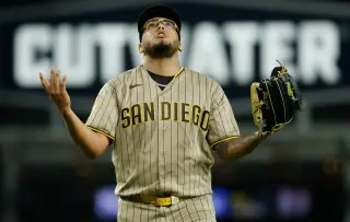 Padres clinch playoff spot with 5-1 win over Dodgers, powered by Salas challenge and Rodriguez's two-inning shutout