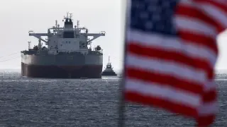 Oil dips below $100 as Trump says Iran talks near completion