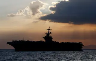 US deploys third carrier and 10,000 troops to Middle East as Iran war escalates