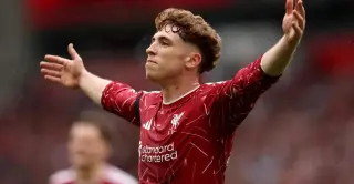 Late Muñoz strike keeps Liverpool in the hunt after 2-2 draw with Forest