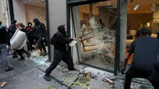 France extends curfews as markets stabilize after violent unrest