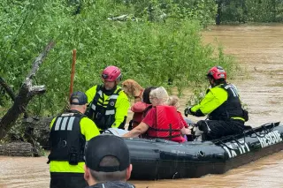 Texas endures record 30 inches of rain in a day as flood rescues unfold