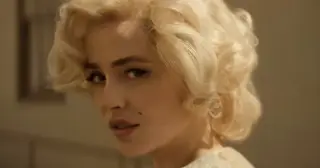 Dakota Johnson Channels Marilyn Monroe in Venice-Bound Short, Flesh Impact