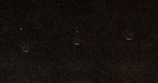 Earth as a Tiny Speck: Mars rover captures a rare Earth-Phobos moment