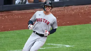 Red Sox Edge Mariners as Woo Faces Road Woes in Fenway Showdown