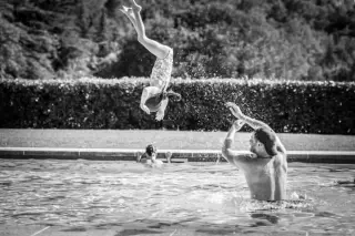 Harry tosses Lilibet into pool in Meghan's summer photos