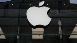 Apple posts record revenue, but cautious forecast spooks investors