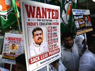 Modi’s cabinet resilience tested as protests push Pradhan resignation