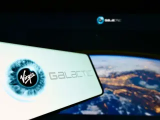 Virgin Galactic Jumps on Settlement News as RSI Signals Overbought