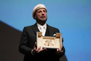Travolta Receives Honorary Palme d’Or at Cannes in Surprise Moment