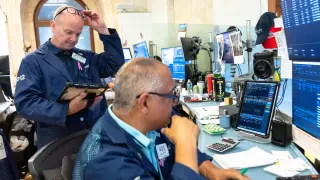 Markets mixed as Middle East tensions lift oil and chip worries linger