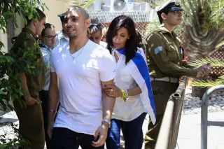 Israel's president grants clemency to medic who shot a wounded Palestinian attacker