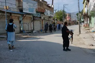 Explosive attack on a Pakistan mosque leaves at least 21 dead, amplifying security fears