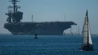 Iran Vows to Sink US Warships as Houthi Strike Hits Saudi Aramco
