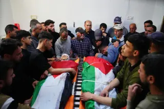 West Bank shooting by Israeli reservist leaves two dead, including 14-year-old