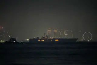USS Lincoln Glides Past Singapore on Homeward Run from Middle East