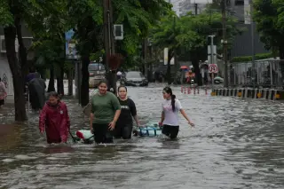 Bangkok's 50 districts hit by record flooding as 4,900 evacuated
