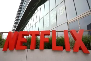 Netflix slips as tepid Q3 outlook douses growth optimism