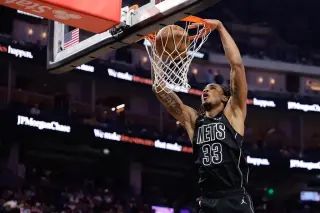 Bulls land Claxton in three-team draft-night swap