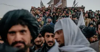 Europe's Migration Crisis Forces Secret Talks with Taliban
