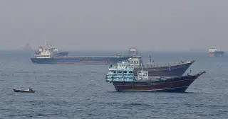 Strait of Hormuz Traffic Freezes as Iran Reverses Opening and Attacks Persist