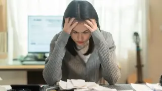 Poverty's long shadow on the brain: financial stress linked to cognitive aging