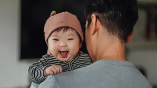 A Melodic Voice Speeds Baby Language and Bonding