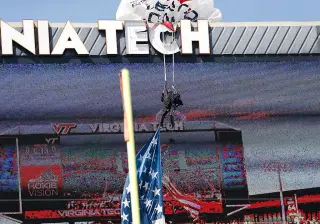 Skydiver Gets Stuck on Virginia Tech Jumbotron During Spring Game
