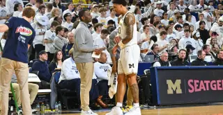 Former Wolverines back Mike Boynton as interim coach after Dusty May exits
