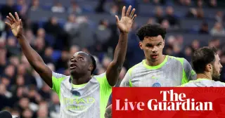 Doku’s curler gives City a halftime edge over Everton