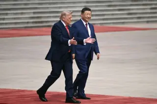 Asia Stocks Diverge as Trump-Xi Talks Loom Over AI Rally