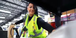 Amazon Boosts Warehouse Wages and Adds Whole Foods Perks
