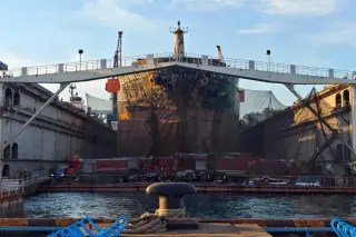 Blaze on docked cargo ship in Qingdao kills 25 during repairs