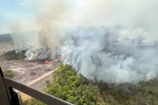 Georgia wildfire swells to 31 sq mi, prompting evacuations
