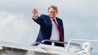 Trump hints at restrained Iran policy, leaning on economic pressure