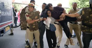 Delhi Lockdown: Youth Protesters Clash with Police as Election Chief Faces Resignation Demands
