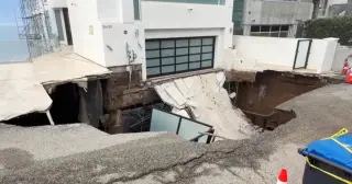 Malibu driveway collapses under pounding surf as coast erodes