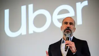 Uber slashes 3,300 jobs to fuel its robotaxi push