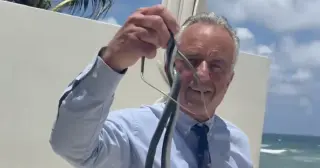 RFK Jr. Tries to Tame Snakes on Oz’s Palm Beach Patio as Cheryl Hines Pleads