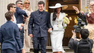 Dua Lipa channels Bianca Jagger in Schiaparelli wedding suit for London ceremony